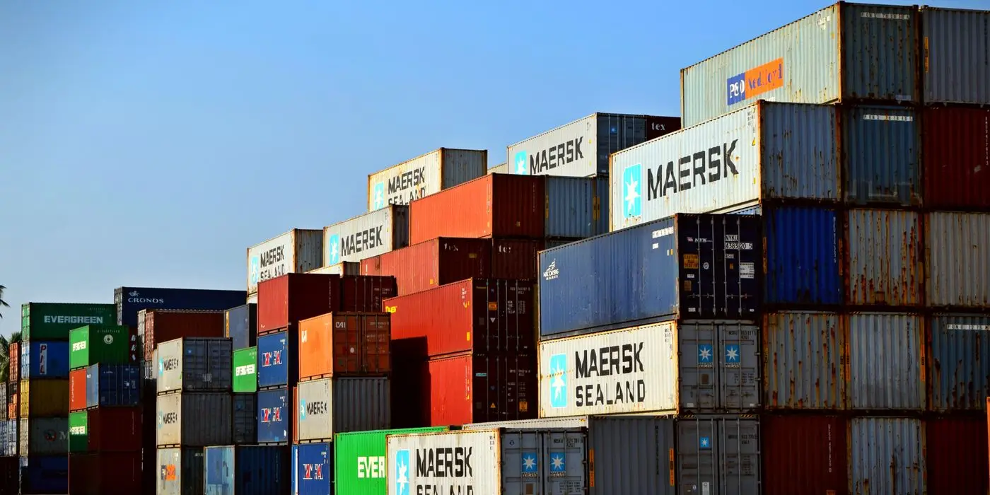 Stacked shipping containers at a port terminal